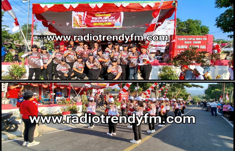 Menyalaa… Lurah Air-Bah Jansy M Pandean Sambut Peserta Gerak Jalan Dibawah Terik Matahari